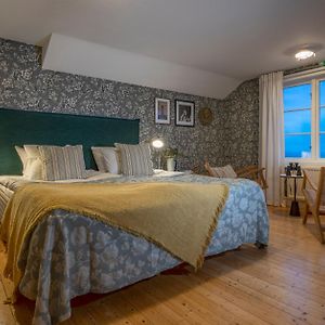 Deluxe Zimmer mit Kingsize-Bett